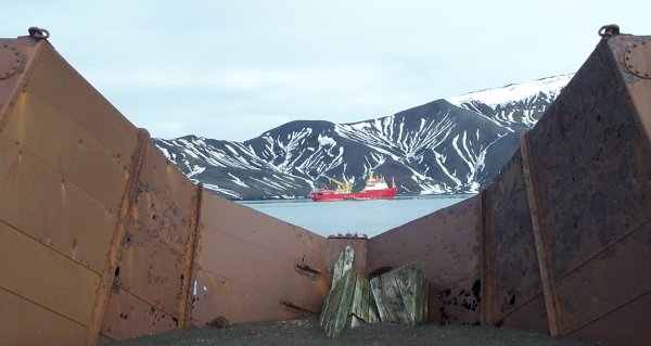 The Shackleton viewed through a dry dock built by the Norwegian whalers on Deception Island.