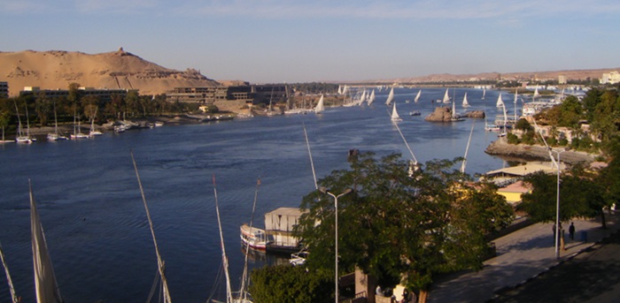 Feluccas sailing on the Nile seen from our hotel room window in Aswan.