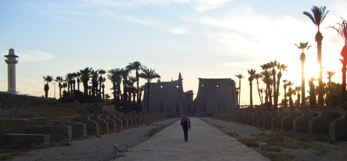 Alice in the Avenue of Sphinxes at Luxor Temple.