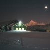 Fuchs House (the field store) and Admirals House (the main accomodation building) during the permanent darkness of winter.